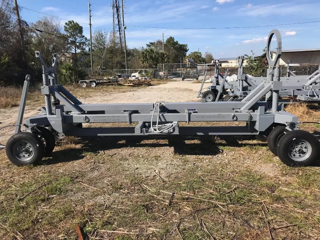 Fabricated equipment frame assemblies staged outdoors.