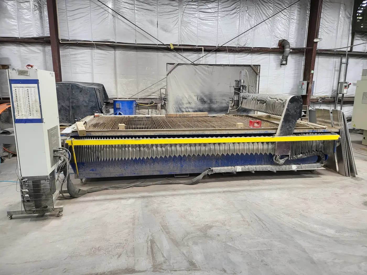 Waterjet cutting table in the shop.